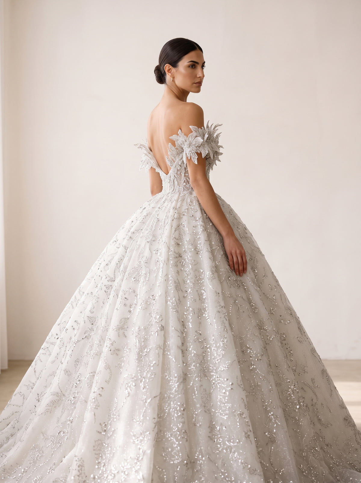 Anastasia ball gown wedding dress back view featuring chapel train by Fiore's Bridal - Back View