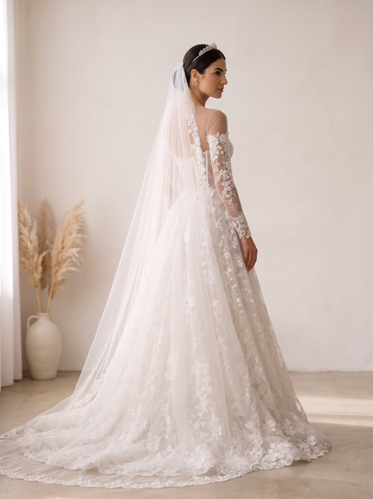 Margot wedding dress back view featuring pearl buttons and chapel train by Fiore's Bridal - Back View
