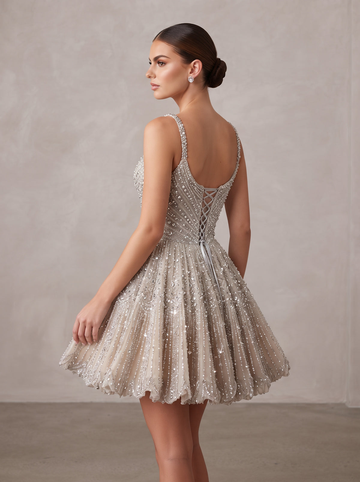 Stella champagne sparkle fit & flare mini dress by Fiore's Bridal - Back View