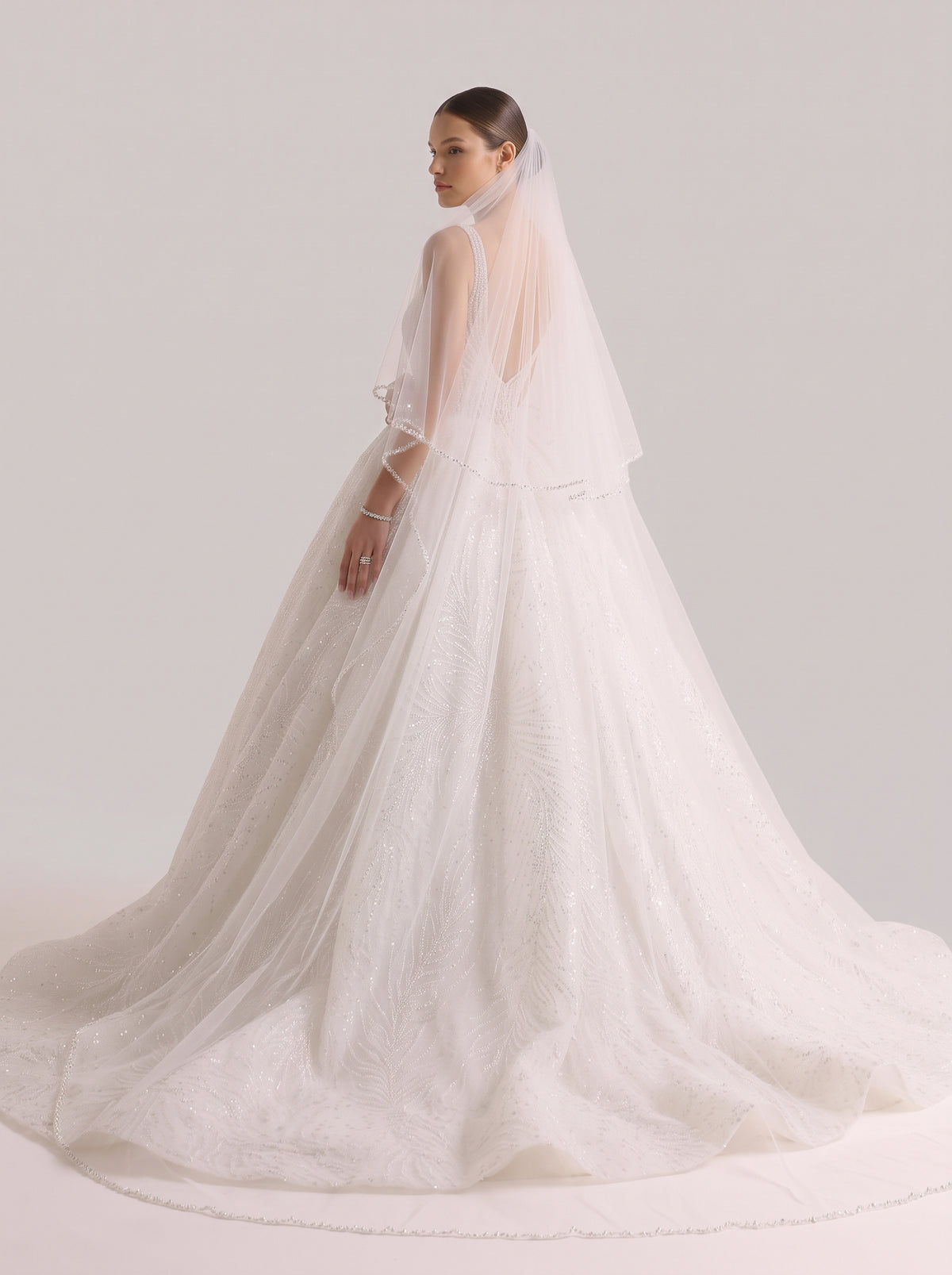 Fiores Sylvie ball gown wedding dress, back view with veil