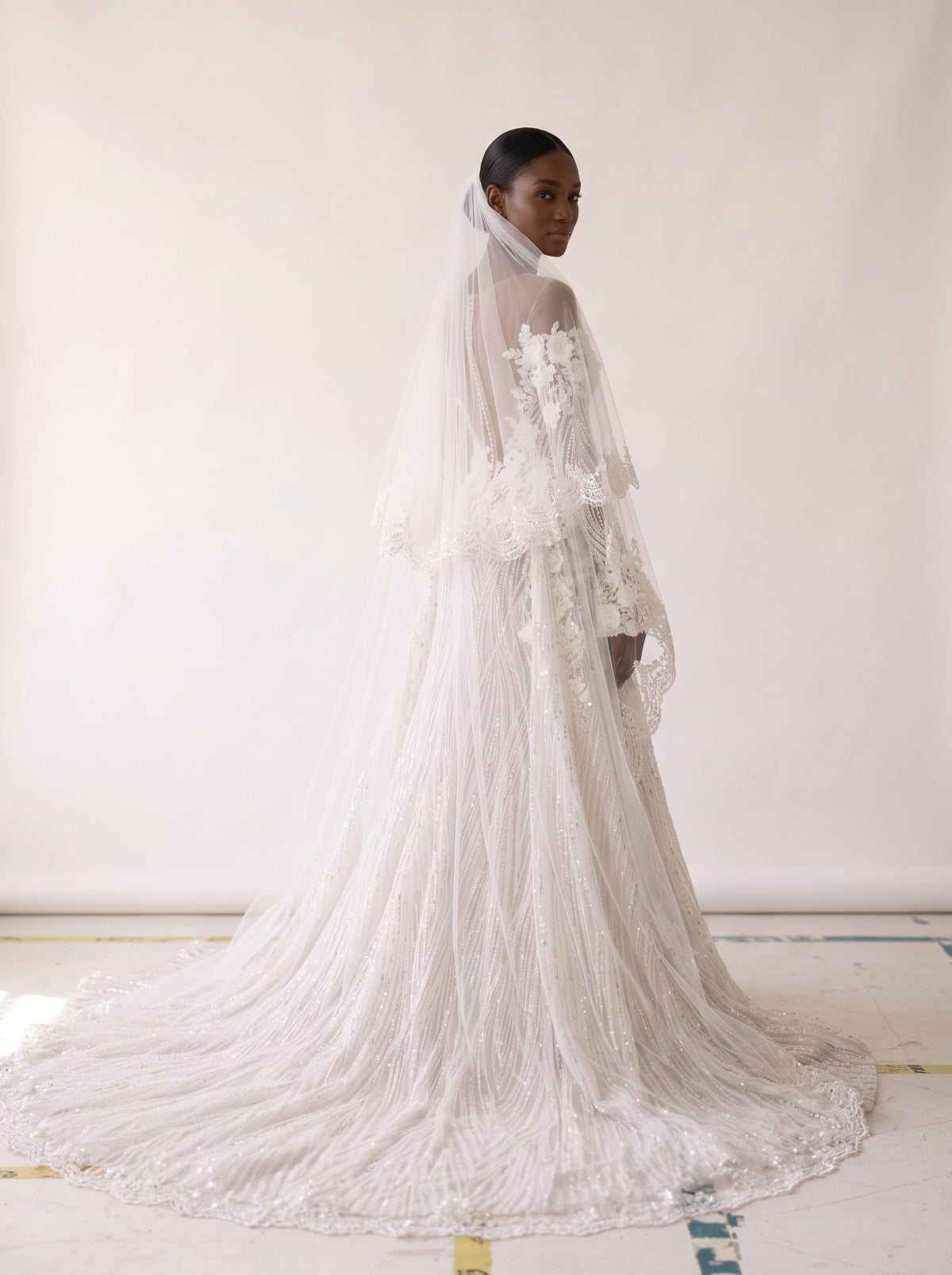 Fiores Cassia sheath wedding dress, back view with veil