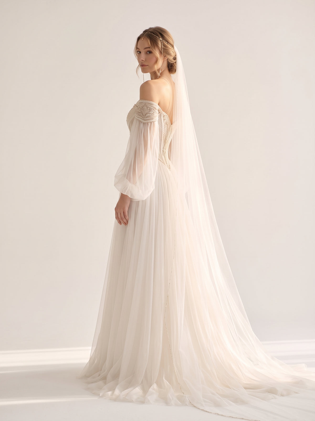 Florenza Helen wedding dress back view featuring fluid chapel train by Fiore's Bridal - Back View