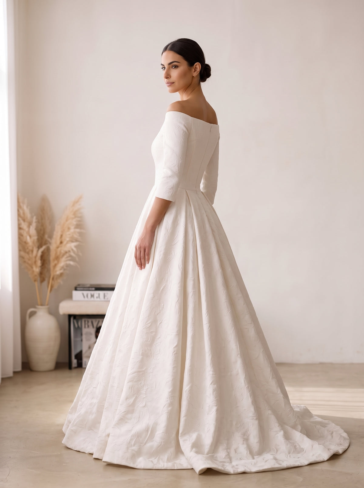 Giselle satin ball gown wedding dress back view featuring covered buttons and chapel train by Fiore's Bridal - Back View