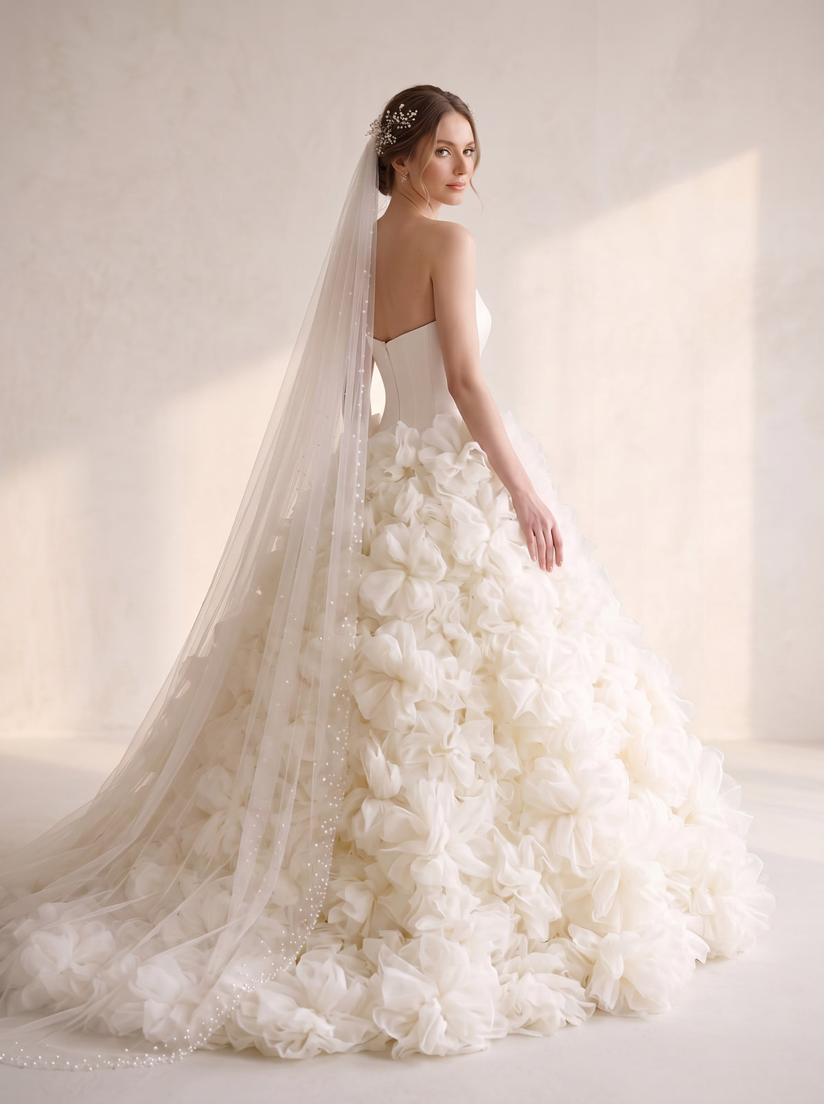 Melia A-line wedding dress back view featuring chapel train by Fiore's Bridal - Back View