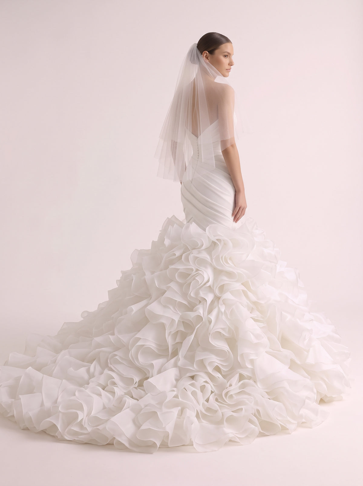 Fiores Nerissa mermaid wedding dress, side view with veil