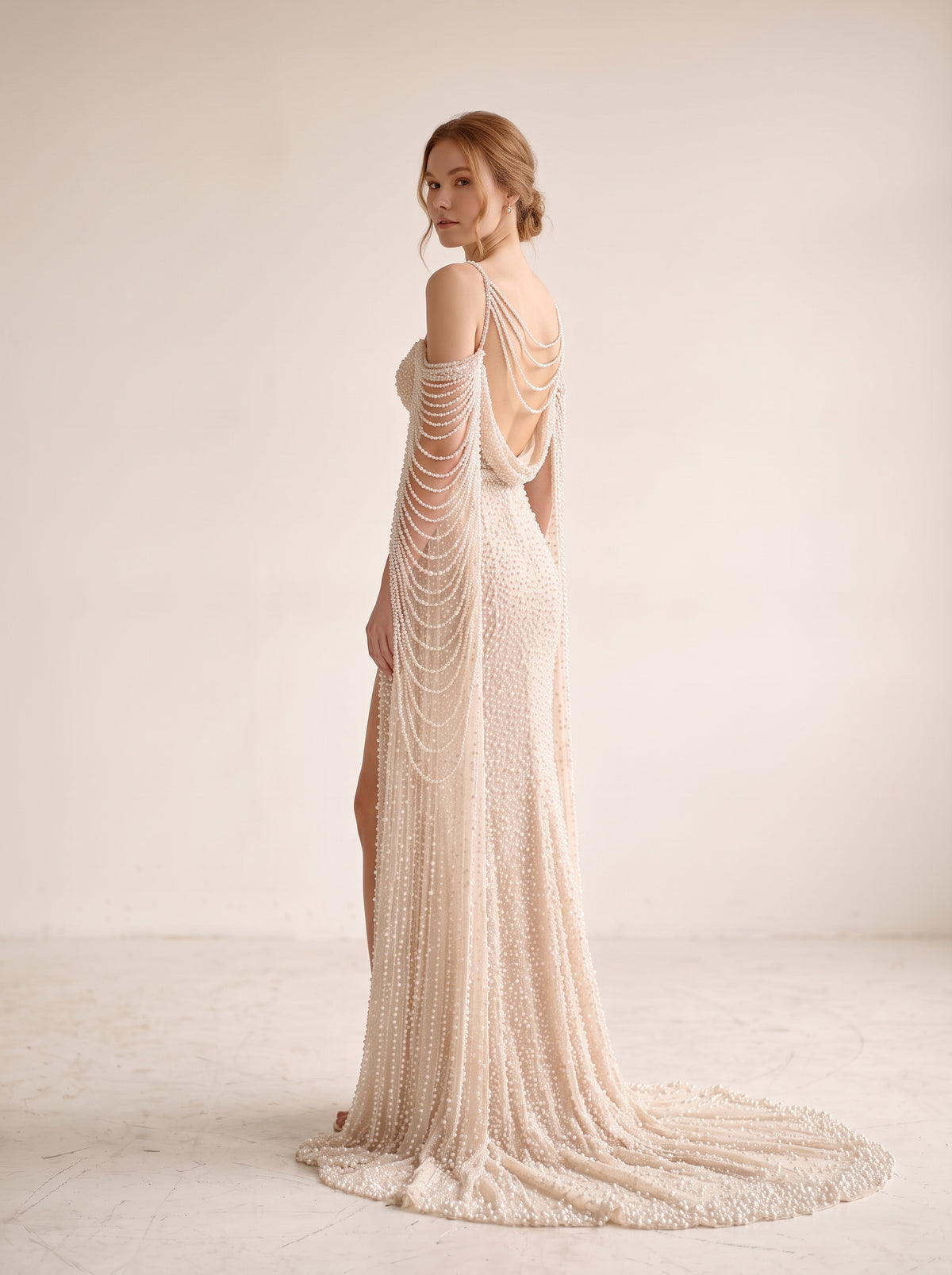 Fiores Perla sheath wedding dress, back view