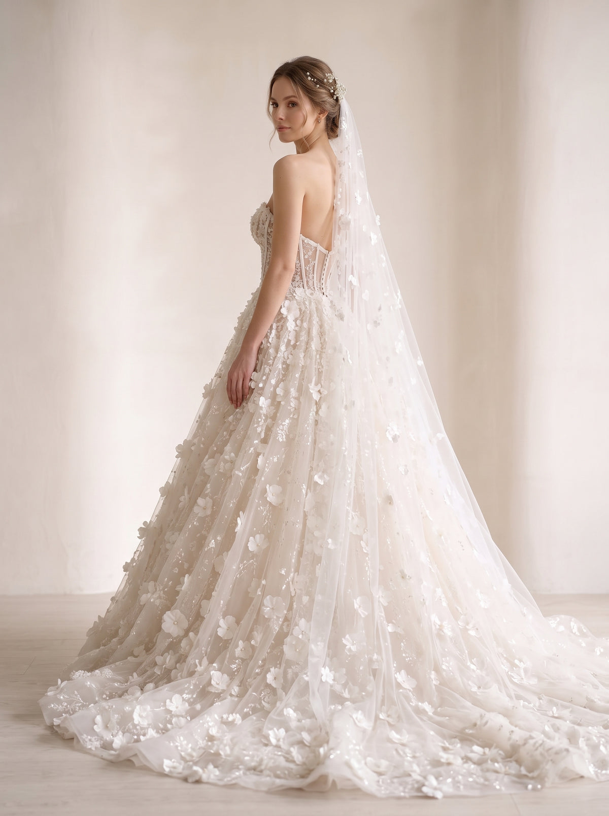 Thais A-line trumpet wedding dress back view featuring chapel train by Fiore's Bridal - Back View